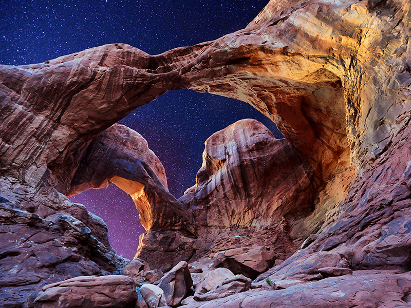 Upward shot of Utah Rocks with starlit sky