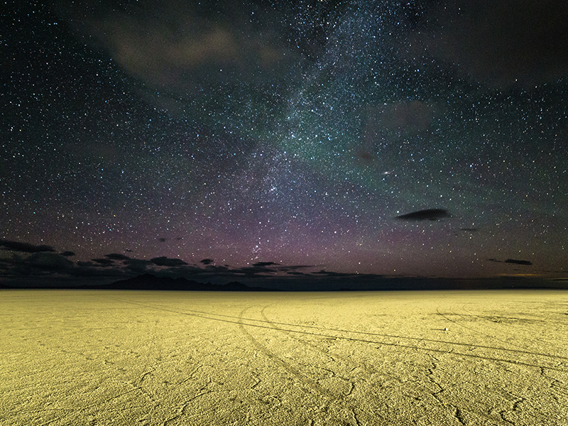 Great Salt Lake with a colorful, starlit sky